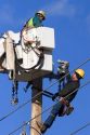 Electric power lineman installing new lines in Boise, Idaho.