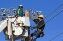 Electric power lineman installing new lines in Boise, Idaho.