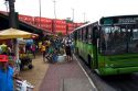 A public transportation bus and street vendors in Manaus, Brazil.