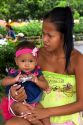 Brazilian woman holding her baby in Manaus, Brazil.