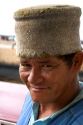 A brazilian porter wearing a wool hat for carrying items on his head in Manaus, Brazil.