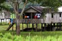 Daily life in a house on stilts in the Amazon, Brazil.