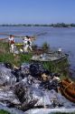 Oil spill clean up on the Mississippi River near New Orleans.