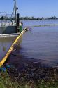 Oil spill clean up on the Mississippi River near New Orleans.