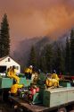 Firefighters watch a forest fire near Lowman, Idaho.