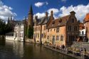 Buildings along a canal at the city of Bruges in the province of West Flanders, Belgium.