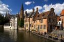 Buildings along a canal at the city of Bruges in the province of West Flanders, Belgium.