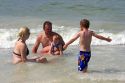 A family plays in the water at St. Petersburg, Florida. MR
