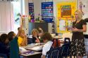 Teacher and fourth grade students in a classroom at a public school in Tampa, Florida.