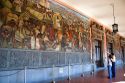People look at a mural painted by Diego Rivera at the National Palace in Mexico City, Mexico.