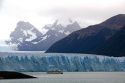 Tour boat in front of the Perito Moreno Glacier located in the Los Glaciares National Park in the south west of Santa Cruz province, Patagonia, Argentina.