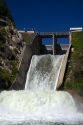 Water pouring from the outlet of Cascade Dam on Cascade Reservior flowing into the Payette River in Valley County, Idaho.