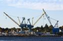 Cranes at the Portsmouth Naval Shipyard located on the Piscataqua River at Kittery, Maine, USA.