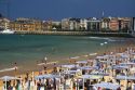 Beach scene at La Concha Bay in the city of Donostia-San Sebastian, Guipuzcoa, Basque Country, Northern Spain.