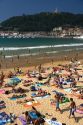 Beach scene at La Concha Bay in the city of Donostia-San Sebastian, Guipuzcoa, Basque Country, Northern Spain.