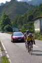 Bicyclists riding through the Picos de Europa near Potes, Liebana, Cantabria, northwestern Spain.