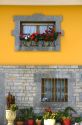 Window box with flowers on a residential home near the town of Potes, Liebana, Cantabria, northwestern Spain.