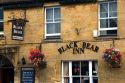 The Black Bear Inn and pub in the town of Moreton-in-Marsh, Gloucestershire, England.