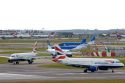 Airliners on the runway at London Heathrow Airport, England, United Kingdom.
