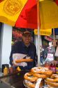 Street vendor selling pretzels in Times Square, Manhattan, New York City, New York, USA.