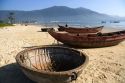 Woven boats and baskets on China Beach near the port city of Da Nang, Vietnam.