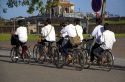 Vietnamese students ride bicycles in Hue, Vietnam.