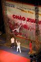 Acrobats entertain on a stage during the Tet festivities in Hanoi, Vietnam.