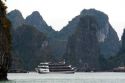 Scenic views of limestone isles and boats in Ha Long Bay, Vietnam.
