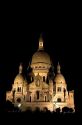 The Sacre-Coeur Basilica at night in Paris, France.