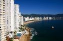 Acapulco Bay lined with hotels in Acapulco, Guerrero, Mexico.