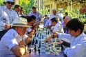 Chilean man and boy playing chess in Santiago, Chile.
