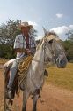 Costa Rican farmer with his horse near the town of Nicoya, Costa Rica. MR
