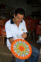 Carretas are elaborately painted oxcarts in the city of Sarchi Norte, Cosat Rica.  This view is a detail of a wheel.