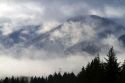 Fog and low clouds over the Cascade Range along Interstate 90 near Ellensburg, Washington, USA.