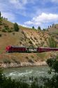 The Thunder Mountain Line scenic tourist train traveling along the Payette River between Horseshoe Bend and Banks, Idaho, USA.