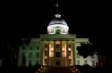 The Alabama State Capitol Building at night located on Goat Hill in Montgomery, Alabama, USA.