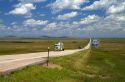 Semi truck traveling on highway 85 north of Spearfish, South Dakota, USA.