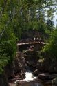 Waterfall and footbridge on the Temperance River near Tofte in northern Minnesota, USA.