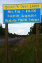 Road sign warning of large fine for speeding along highway 17 near Thunder Bay, Ontario, Canda.