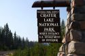 Crater Lake National Park entrance sign located in southern Oregon, USA.