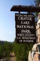 Crater Lake National Park entrance sign located in southern Oregon, USA.