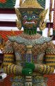Buddhist mythology yaksa guarding the Temple of the Emerald Buddha located within the precincts of the Grand Palace, Bangkok, Thailand.