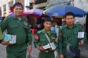 Burmese military veterans in uniform selling books on the street in (Rangoon) Yangon, (Burma) Myanmar.