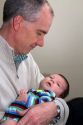 Father holding his infant son in Boise, Idaho, USA. MR