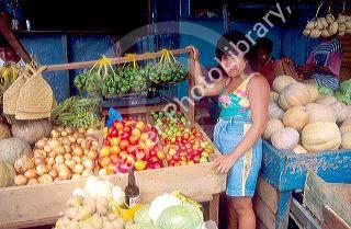 Brazillian woman at market selling produce in Manaus, Brazil.