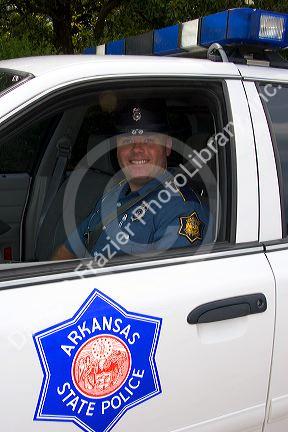Arkansas State Police trooper and car in Ozark, Arkansas.arkansas, arkansas state police, police, police officer, officer, cop, law enforcement, police car, ozark, uniform, smile