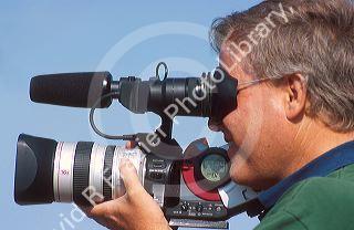Video cameraman in action.  (MR)