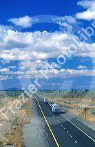 Trucks and automobiles traveling on Interstate 80 near Lovelock, Nevada.
