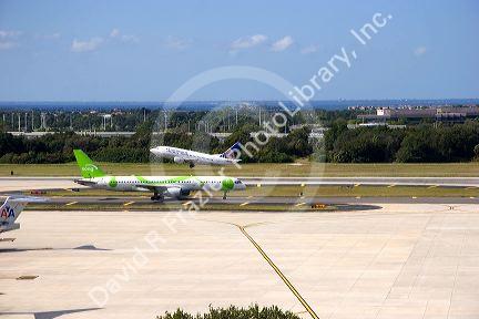 Airplanes taking off and landing at the Tampa International Airport, Tampa, Florida.