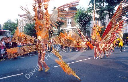 Dancers in the Notting Hill carnival in London, England parade.
